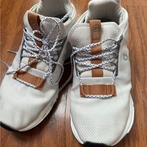 On Running Cream and Brown Athletic Shoes